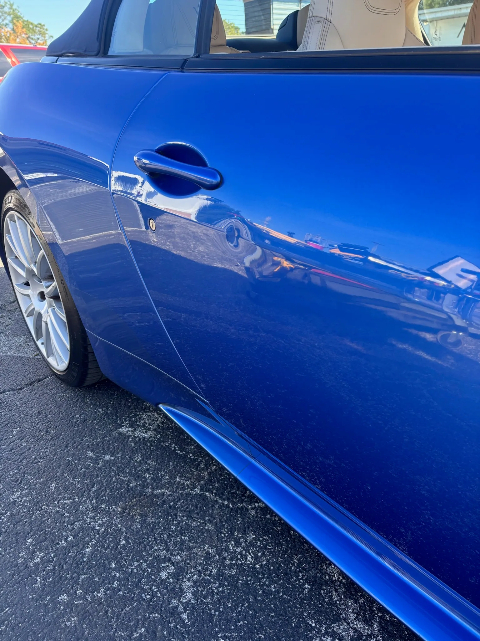 Door dent below the handle