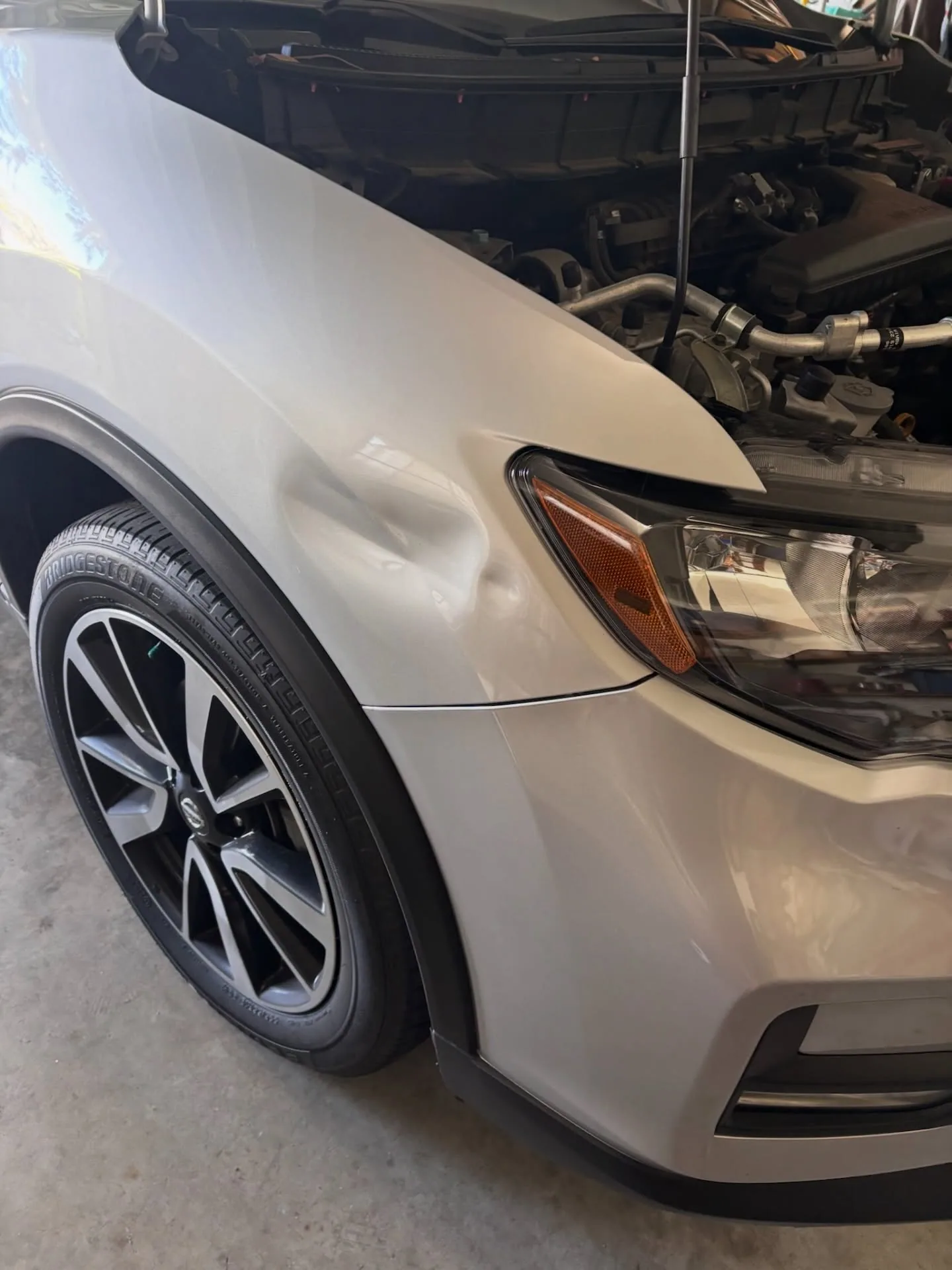 Front fender dent