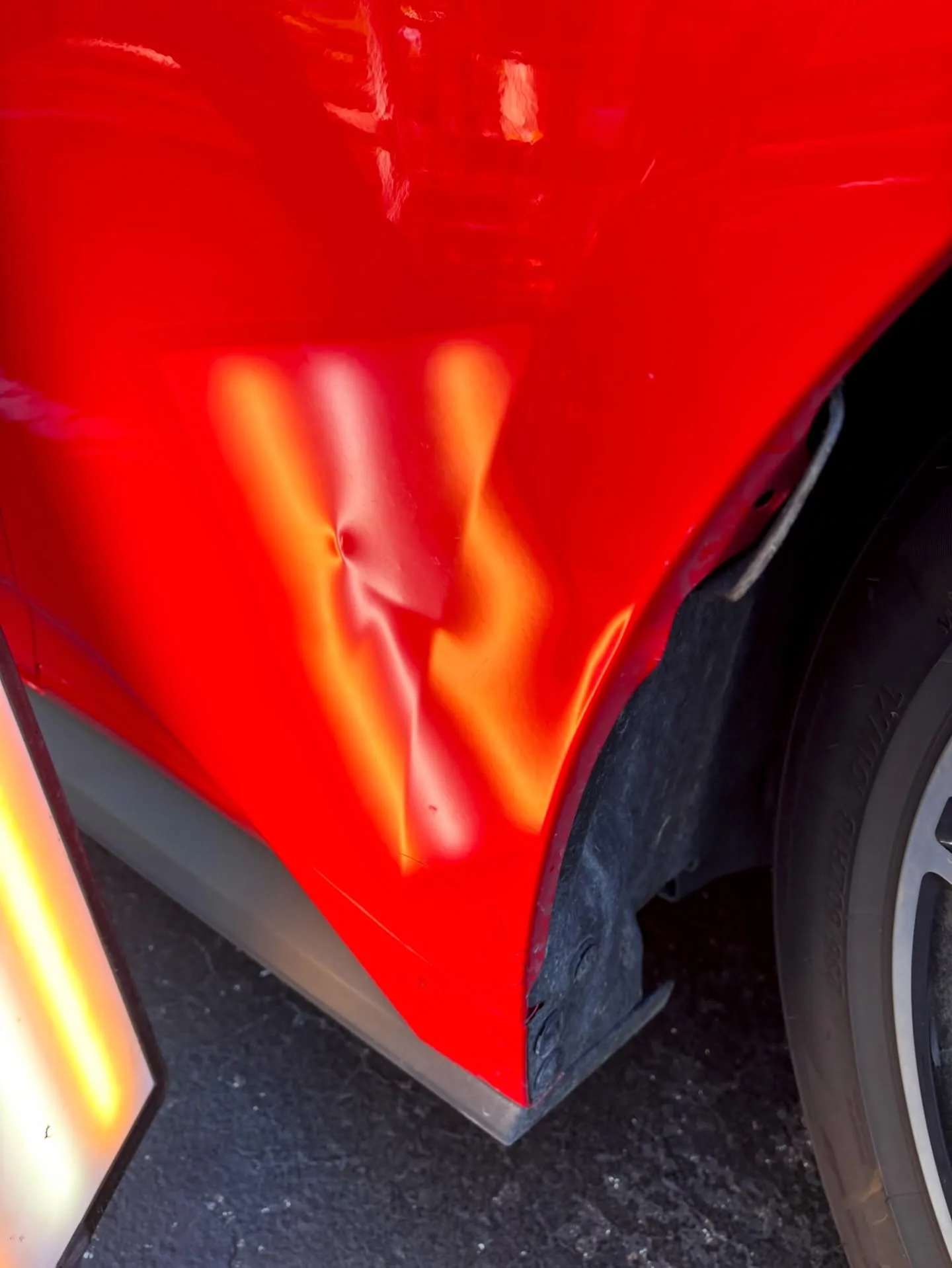Rear quarter dent under a line board